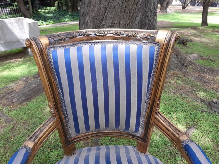 A Pair Of 20th Century French Louis XVI Styled Ornately Carved And Gilded Arm Chairs - Image 5