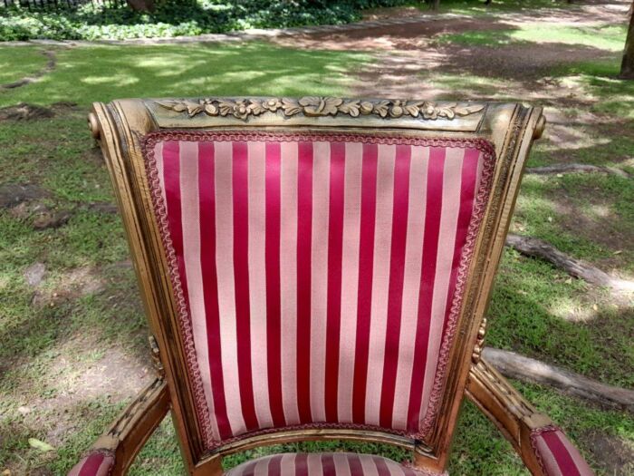 A Pair Of 20th Century French Louis XVI Styled Ornately Carved And Gilded Arm Chairs - Image 10