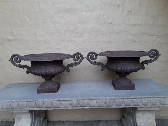 A 20th Century Pair Of Decorative Cast Iron Urns