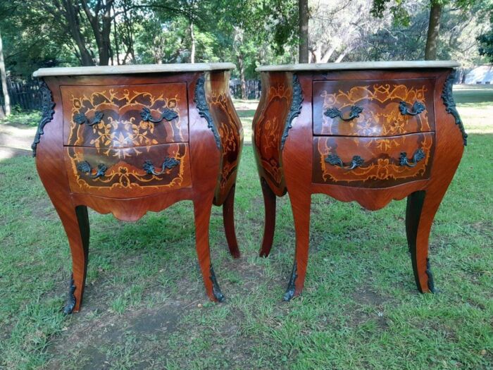 A 20th Century Pair Of French Style Inlaid Mahogany Pedestals With Drawers And Marble Tops