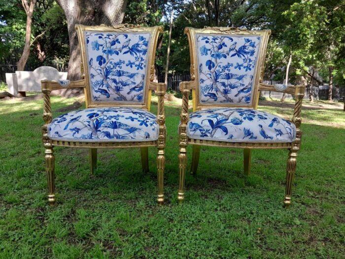 A Pair Of French Style Ornately Carved Wooden Armchairs