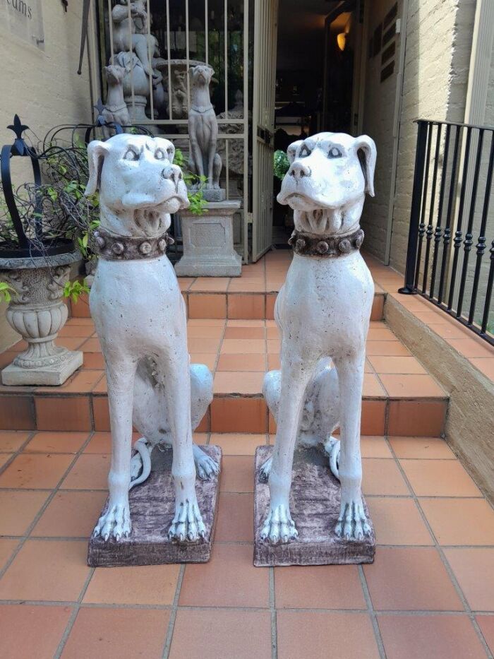 An Early 20th Century Pair Of Italian Porcelain Decorative Dogs On Clay Bases