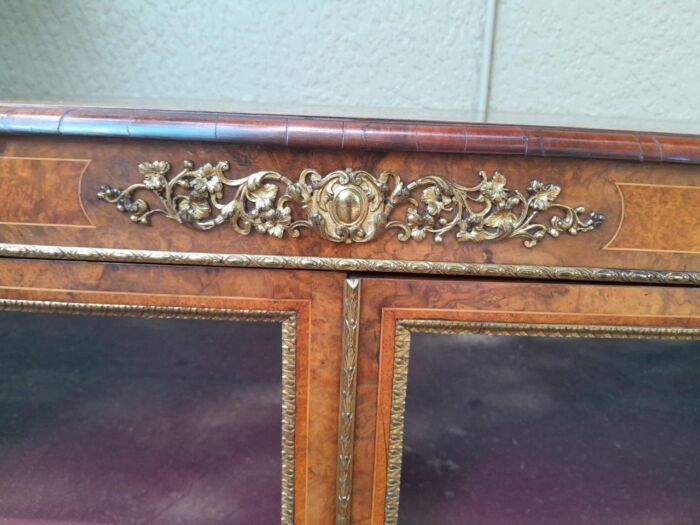 A Victorian Walnut Credenza / Display Cabinet With Gilt Mounts And Glazed Doors With Shelves On Bracket Feet - Image 7