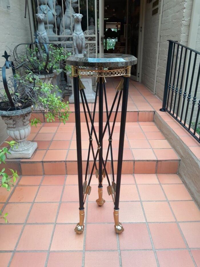 A 20th Century Metal And Brass Plinth