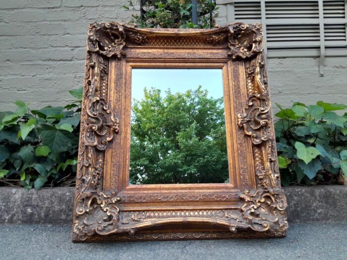 A 20th Century French Baroque Style Gilded And Bevelled Plate Mirror