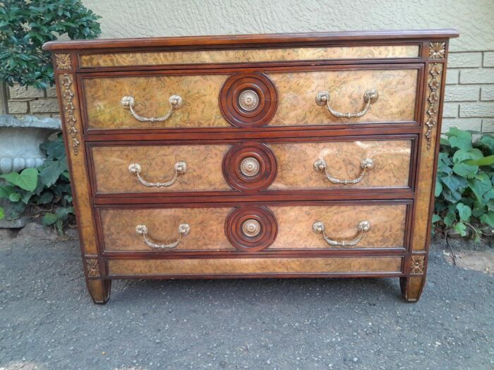 A Theodore Alexander Verre Églomisé Chest With Three Drawers And Brass Decoration