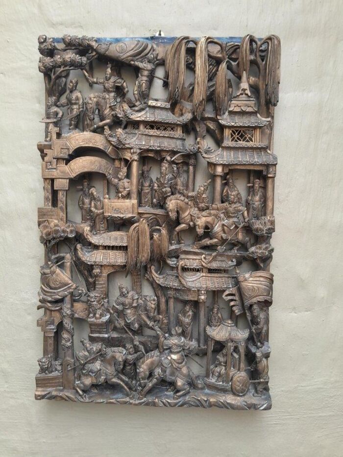 A Heavily Carved Wooden Chinese Giltwood Panel