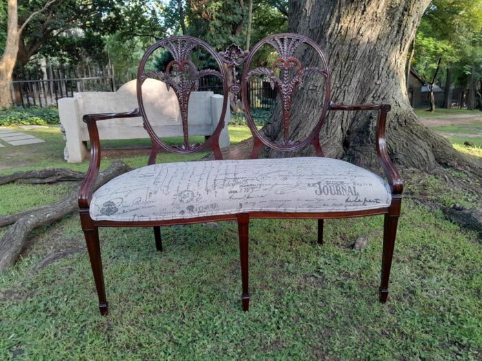 A Victorian Circa 1890 Carved Mahogany Settee Upholstered in a Custom Made Script Linen  for The Crown Collection