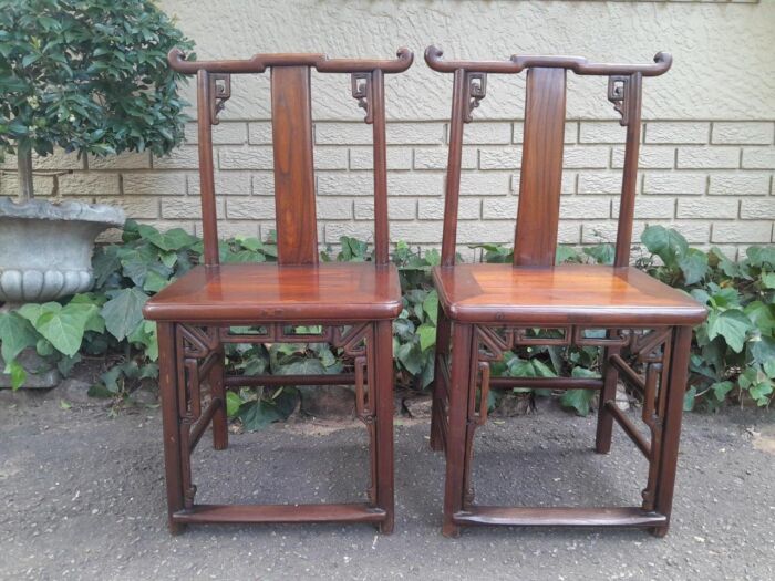 A 20th Century Pair Of Chinese Elm Yoke Back Wooden Chairs With Excellent Patina