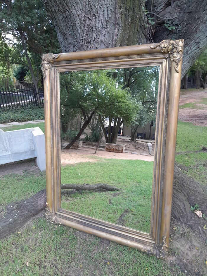 A 20th Century French Style Ornately Carved And Hand Gilded Bevelled Mirror - Image 4