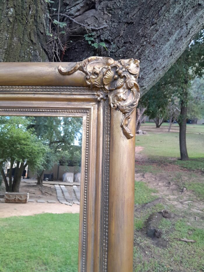 A 20th Century French Style Ornately Carved And Hand Gilded Bevelled Mirror - Image 6