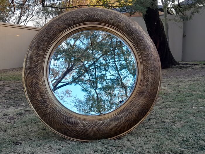 A Hang Gilded in Gold Leaf Bevelled Circular Mirror