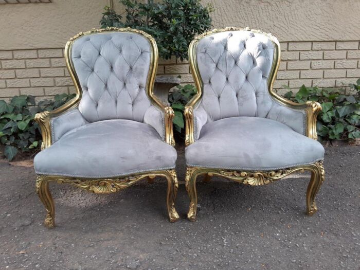 A Pair Of French Style Carved Wooden Gilded Armchairs