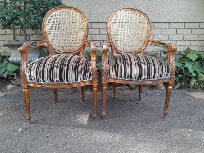 A Pair Of French Style Rattan And Carved Wooden Gilded Armchairs