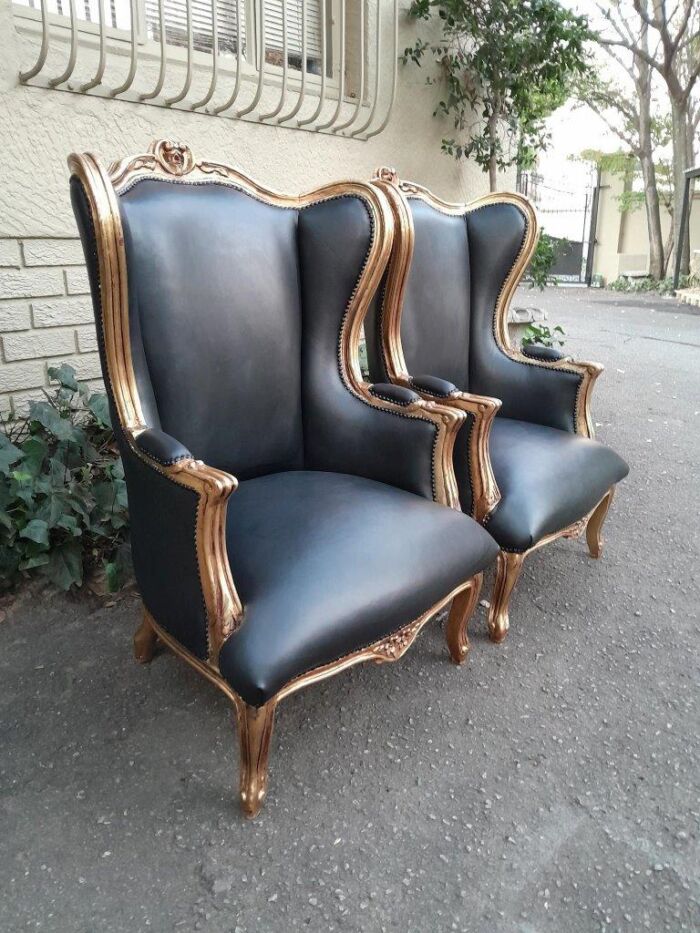 A Pair Of French Style Louis XVI Style Carved And Hand Gilded Wingback Chairs Upholstered In Leather - Image 5