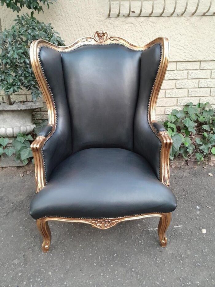 A Pair Of French Style Louis XVI Style Carved And Hand Gilded Wingback Chairs Upholstered In Leather - Image 6