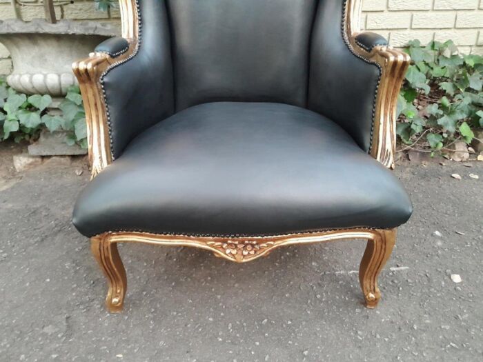 A Pair Of French Style Louis XVI Style Carved And Hand Gilded Wingback Chairs Upholstered In Leather - Image 9