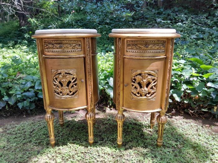 A Pair of French Style Ornately Carved Giltwood Pedestals / Side Tables with Marble Tops