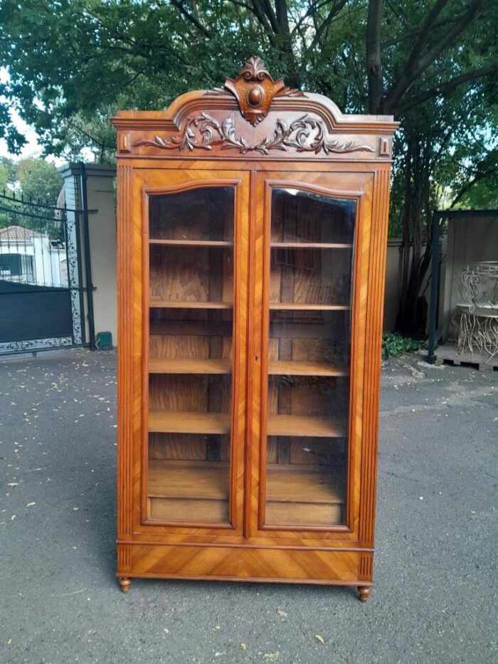 A 19th Century French Rococo Style Bookcase with Bevelled Glass