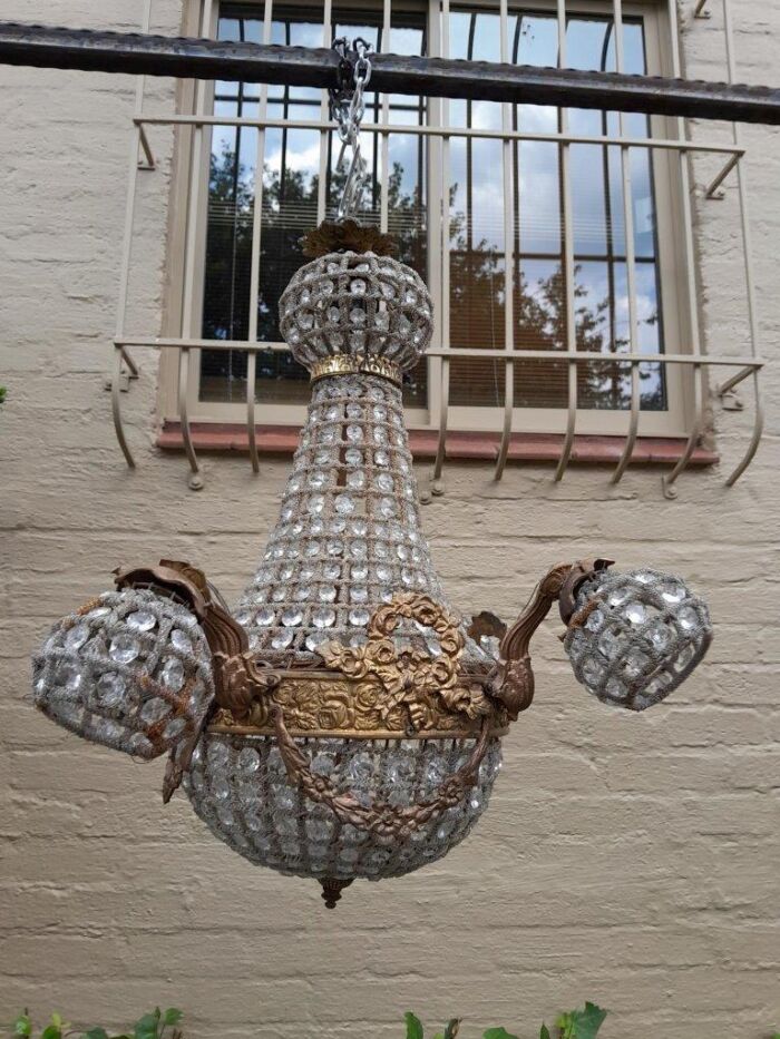 A Brass Gilt & Aged Monumental Empire Style Chandelier