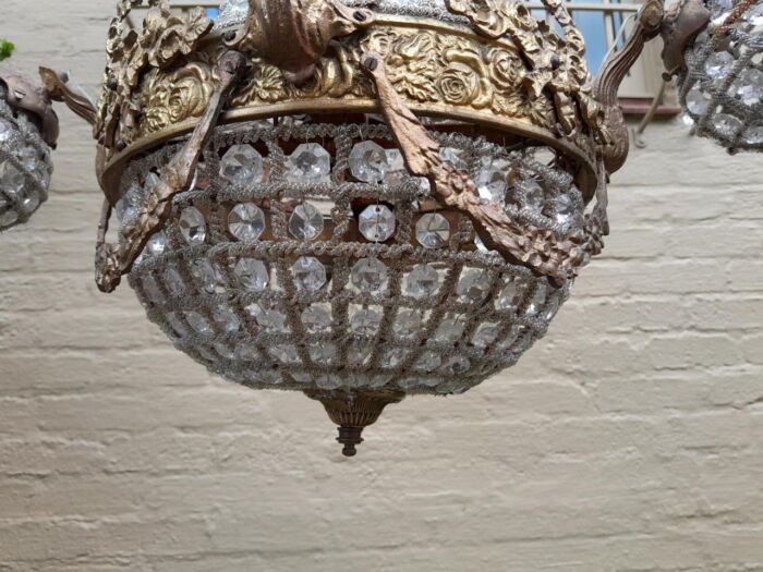 A Brass Gilt & Aged Monumental Empire Style Chandelier - Image 4