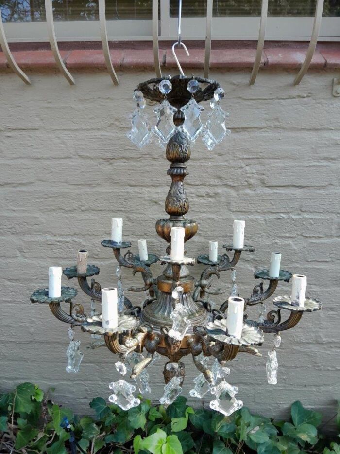 A 20th Century French Style Antique Brass and Crystal Twelve Light Chandelier - Image 3