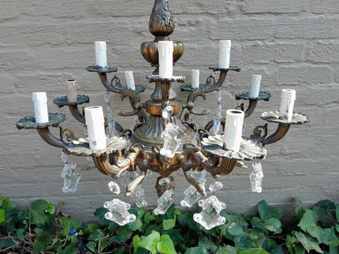 A 20th Century French Style Antique Brass and Crystal Twelve Light Chandelier - Image 6