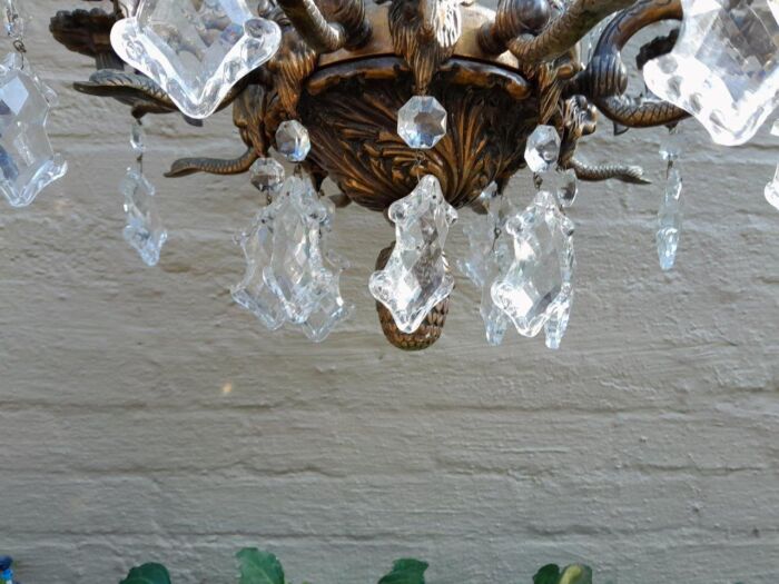 A 20th Century French Style Antique Brass and Crystal Twelve Light Chandelier - Image 7