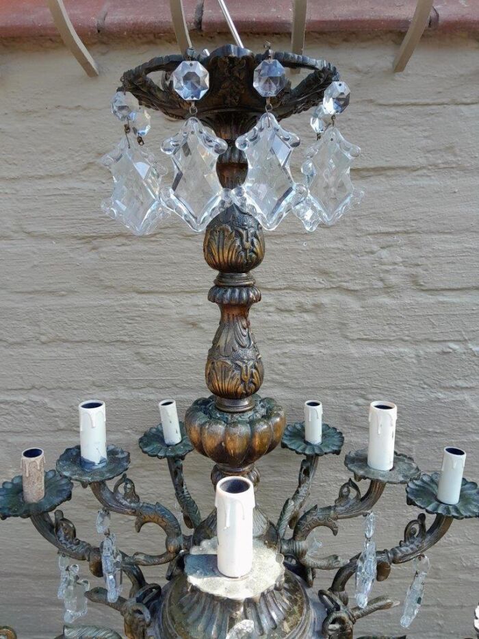 A 20th Century French Style Antique Brass and Crystal Twelve Light Chandelier - Image 8