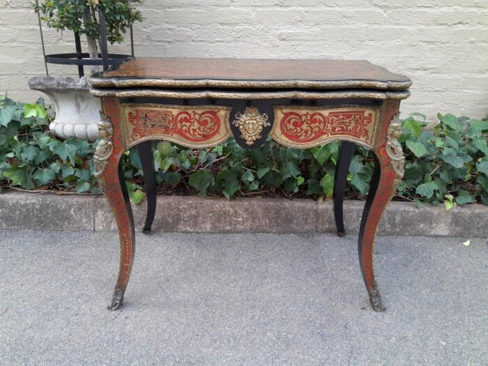 A 19TH Century Boulle and Ebonised Orrmolu Mount Card Table