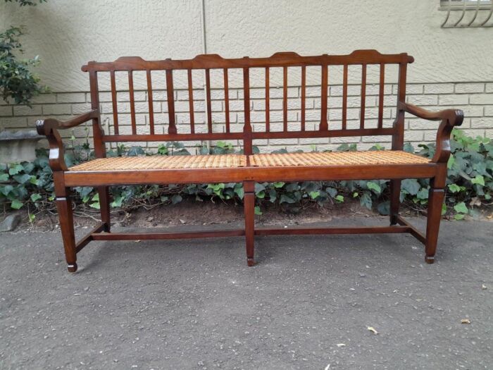 A 19th Century Cape Stinkwood Neo Classical Bench with Rattan Seat