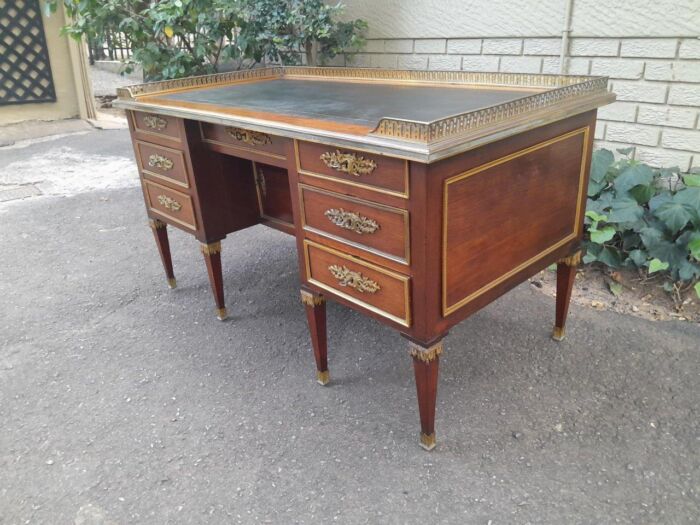 A 20th Century French Empire Style Mahogany Desk with Leather and Gilt Tooling Writing Surface and Brass Gallery - Image 3