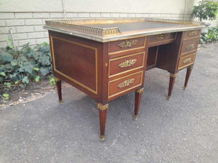 A 20th Century French Empire Style Mahogany Desk with Leather and Gilt Tooling Writing Surface and Brass Gallery - Image 4