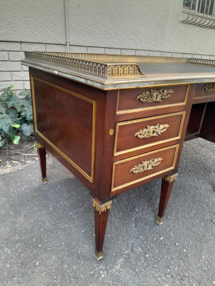 A 20th Century French Empire Style Mahogany Desk with Leather and Gilt Tooling Writing Surface and Brass Gallery - Image 5