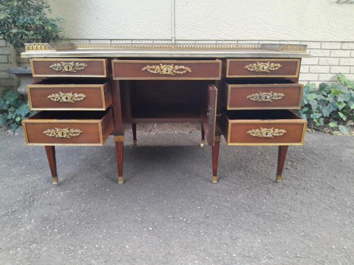 A 20th Century French Empire Style Mahogany Desk with Leather and Gilt Tooling Writing Surface and Brass Gallery - Image 6