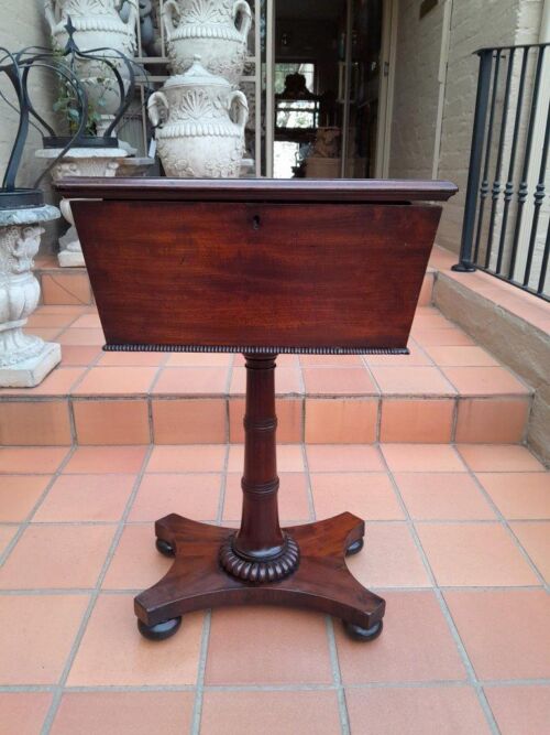 An Early 19th Century Regency Mahogany Tea Poy on Stand