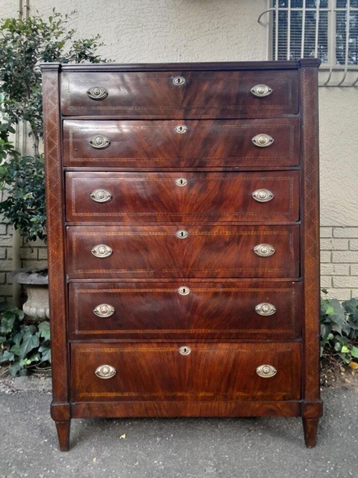 A 19th Century Victorian Flame Mahogany and Inlaid Chest of Drawers