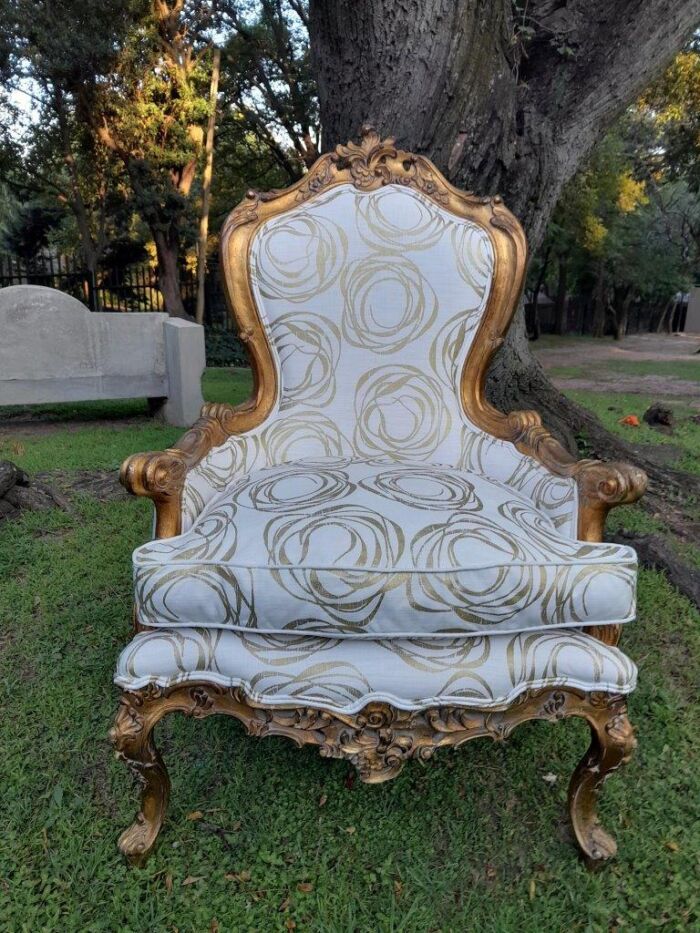 A 19th Century French Ornately Carved and Gilded Armchair of Large Proportion