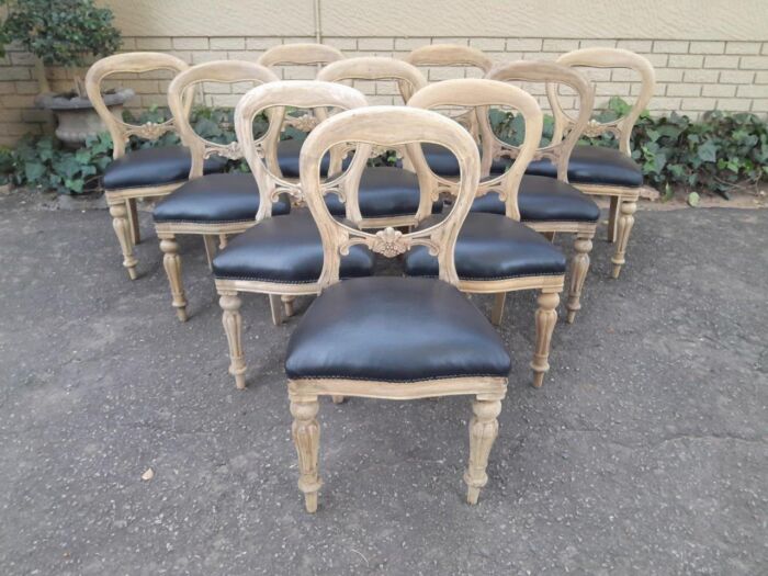 A Victorian Style Set of Ten Dining Chairs in a Contemporary Bleached Finish with Deep Buttoned Leather Seats