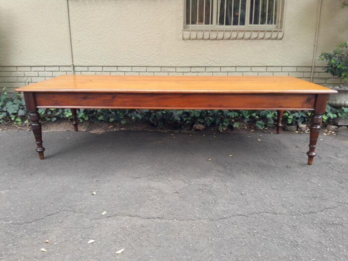 An Antique 20th Century Large Yellowwood and Stinkwood Dining Table