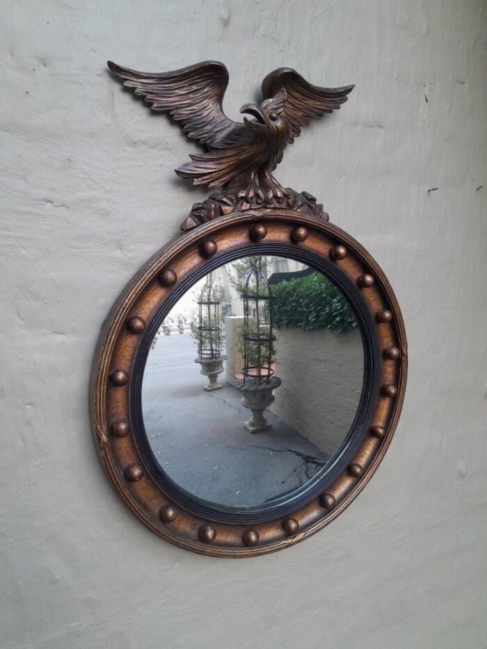 An Antique Regency Convex Eagle Mirror