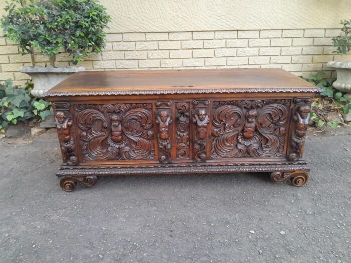 A Late 17th/Early 18th Century Circa 1800 Heavily Carved Walnut Chest with Original Cast-iron  Lock and Original Key and Two Cast Iron Handles on each side 