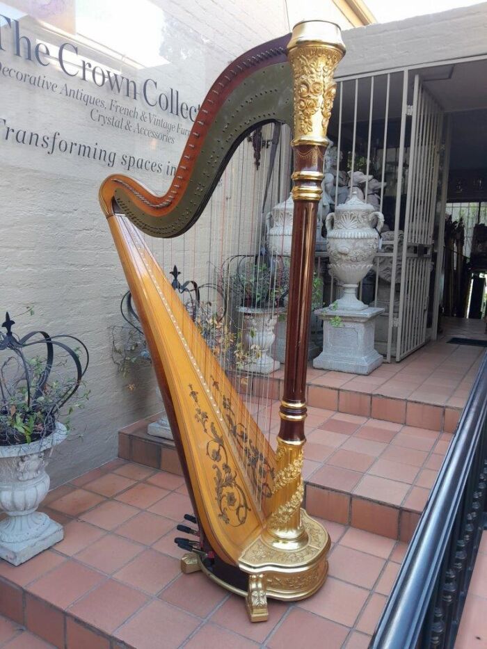 A 20th Century Venus Grand Harp on Gilt Wood Carved Base on Gilt Wood Bracket Feet.