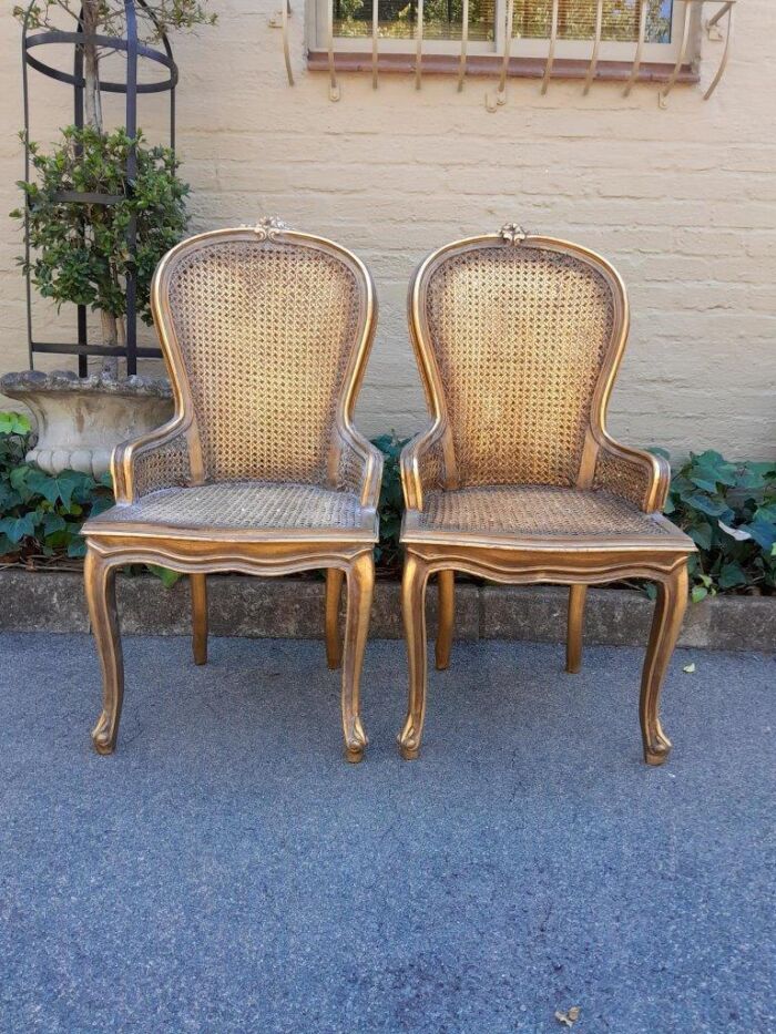 A Pair of French Style Ornately Carved and Gilded Rattan High Back Armchairs - Image 2