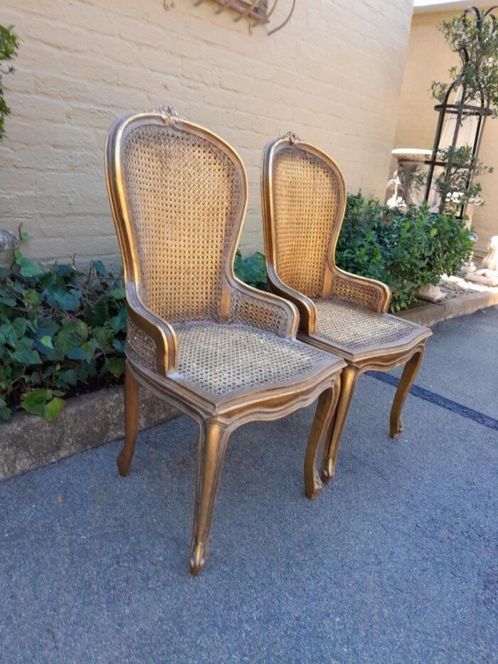 A Pair of French Style Ornately Carved and Gilded Rattan High Back Armchairs - Image 5