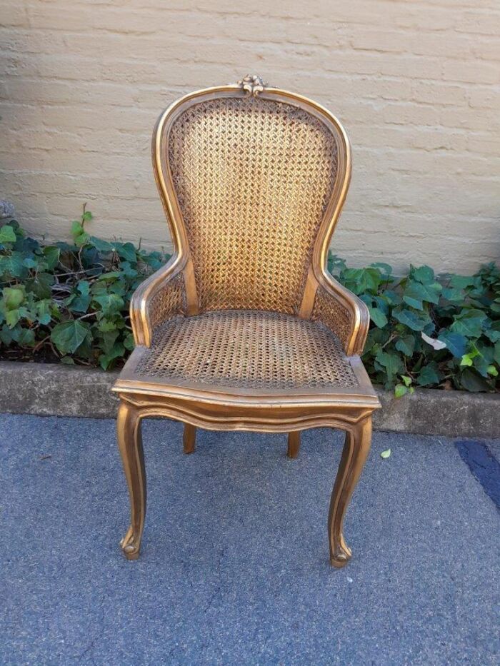 A Pair of French Style Ornately Carved and Gilded Rattan High Back Armchairs - Image 6