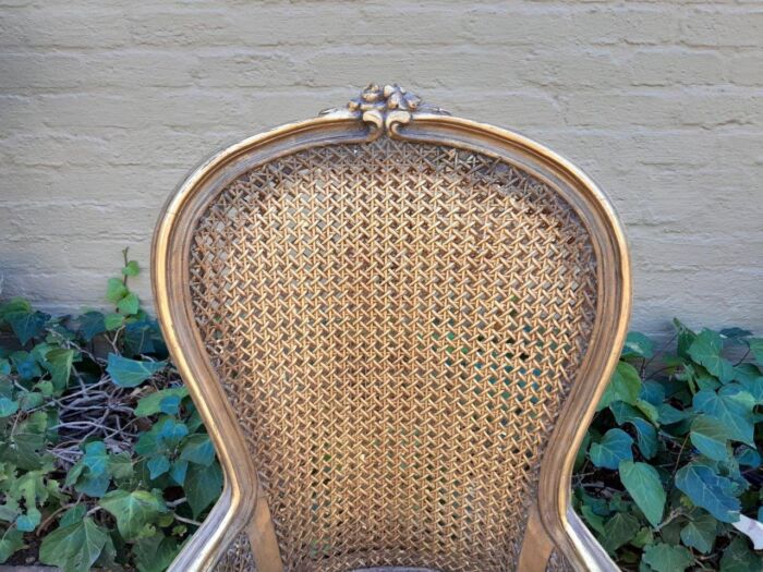 A Pair of French Style Ornately Carved and Gilded Rattan High Back Armchairs - Image 9