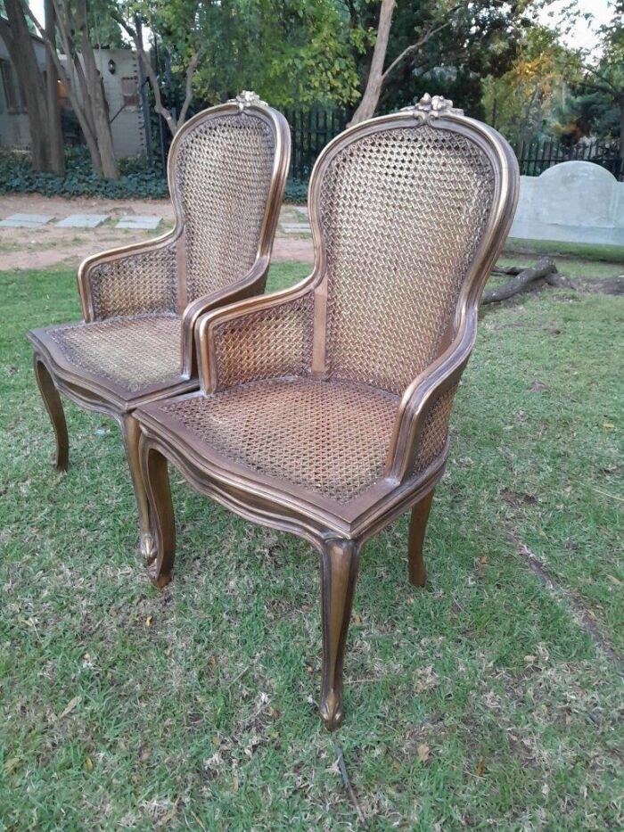 A Pair of French Style Ornately Carved and Gilded Rattan High Back Armchairs - Image 13