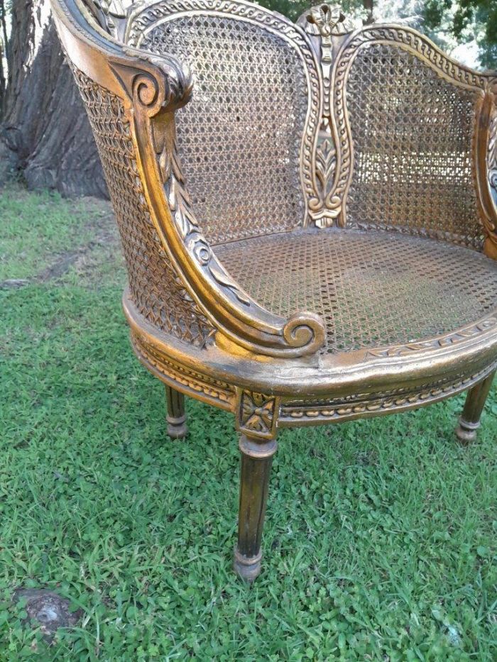 A French Louis XVI Style Pair Of Carved And Giltwood Rattan Bergere Chairs - Image 5