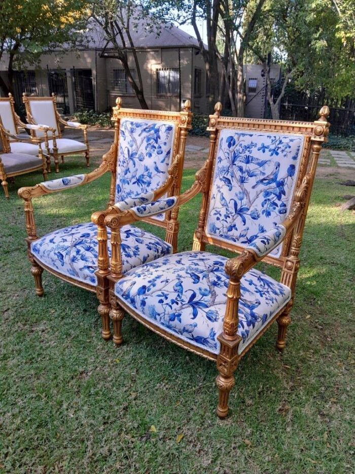 A Pair of French Style Ornately Carved Giltwood Arm Chairs - Image 10